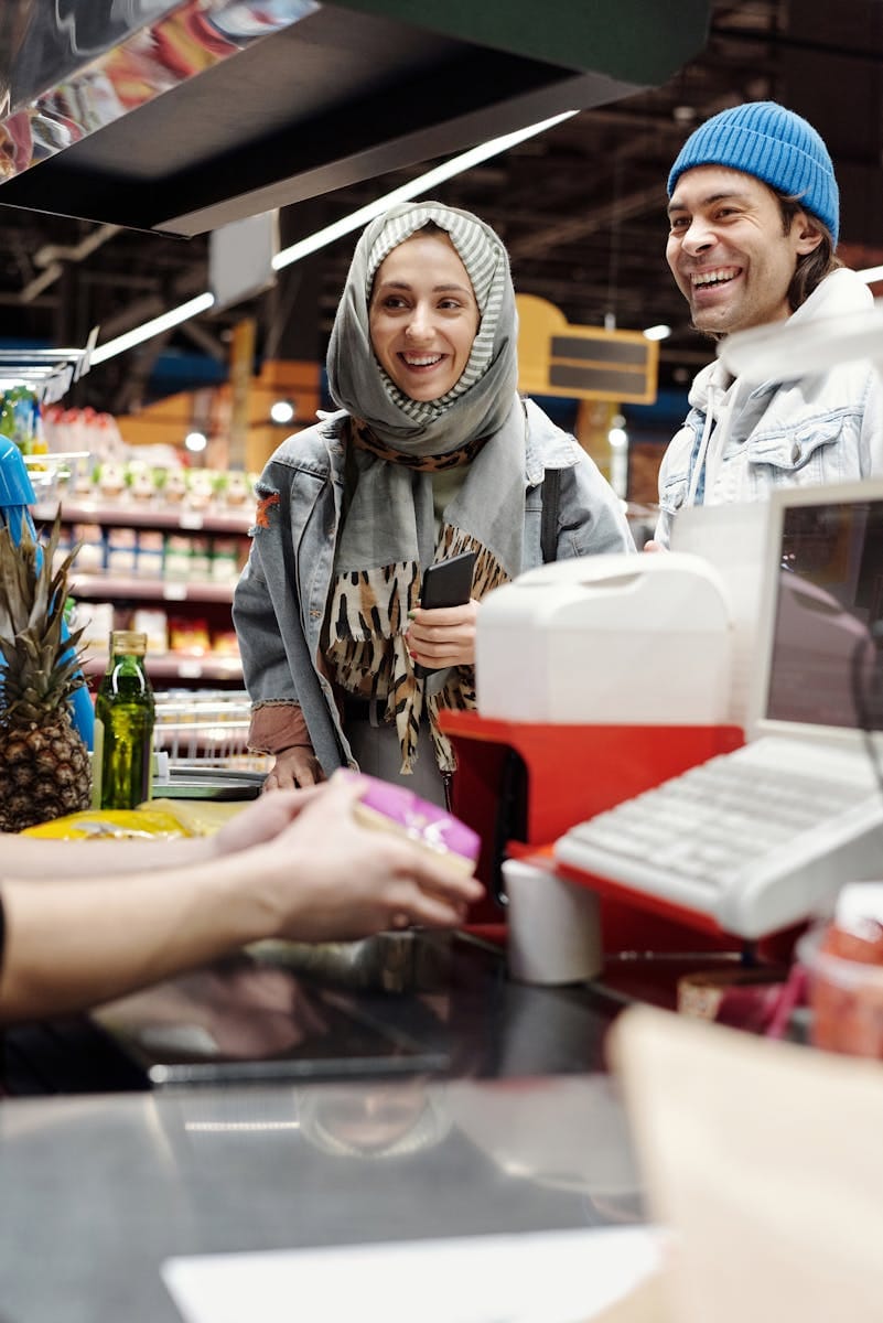 Happy Couple Buying Groceries